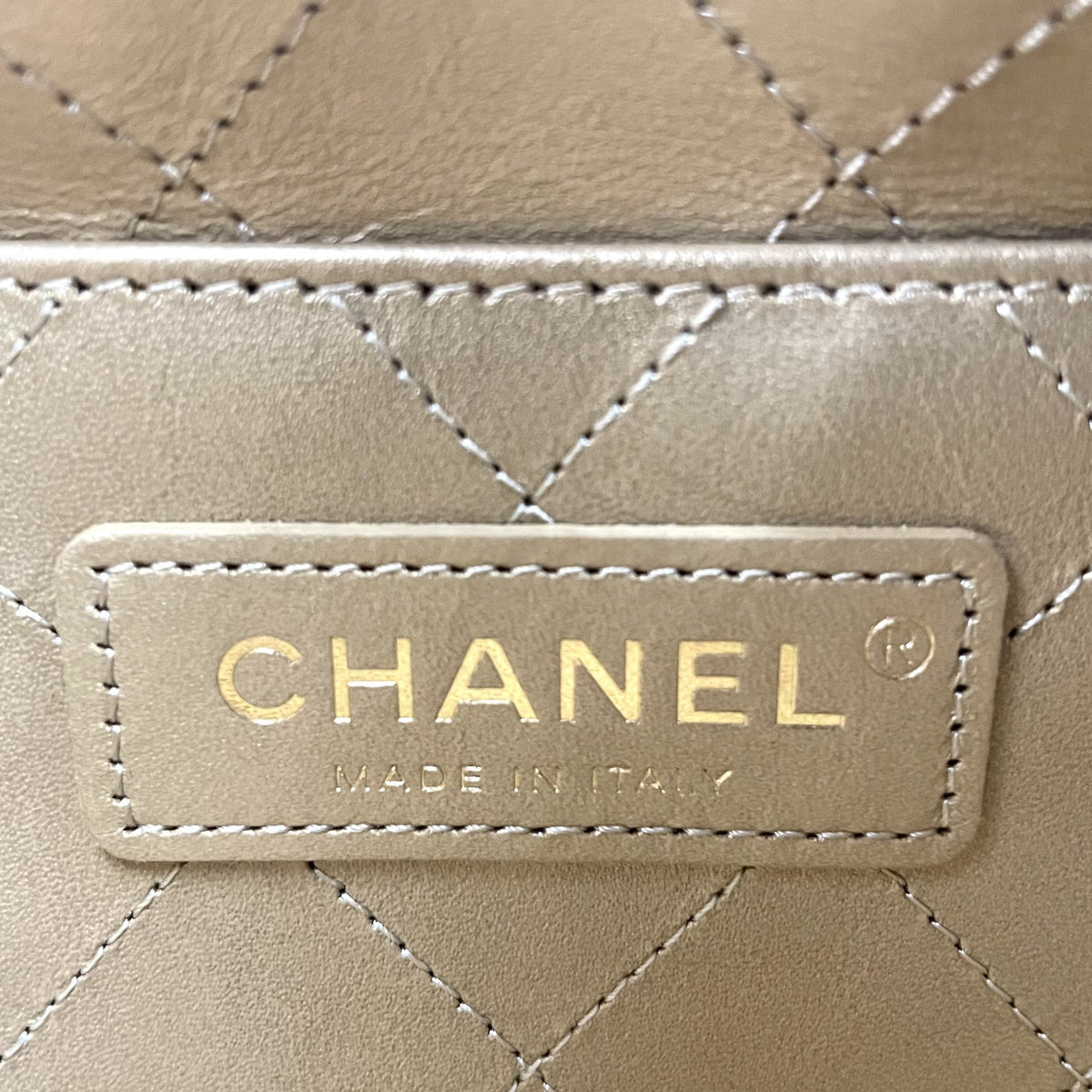 CHANEL Logo Charm CC Lambskin Drawstring Bucket Bag Chanel