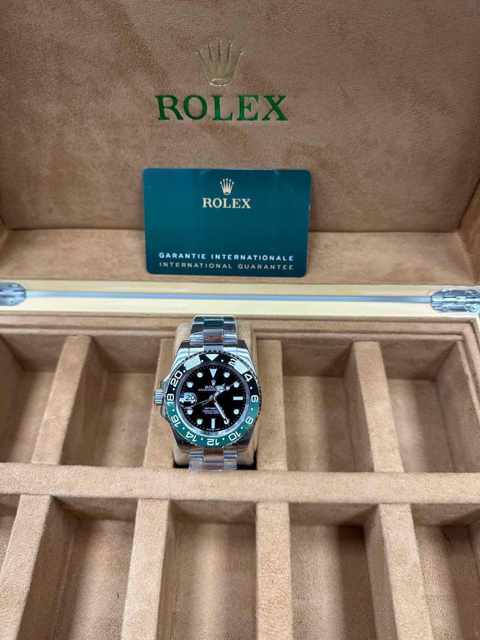 Rolex GMT-Master II Men's Watch Green and Black Bezel Crown Placement Silver Bracelet UK Replica AAA Best Quality Reps