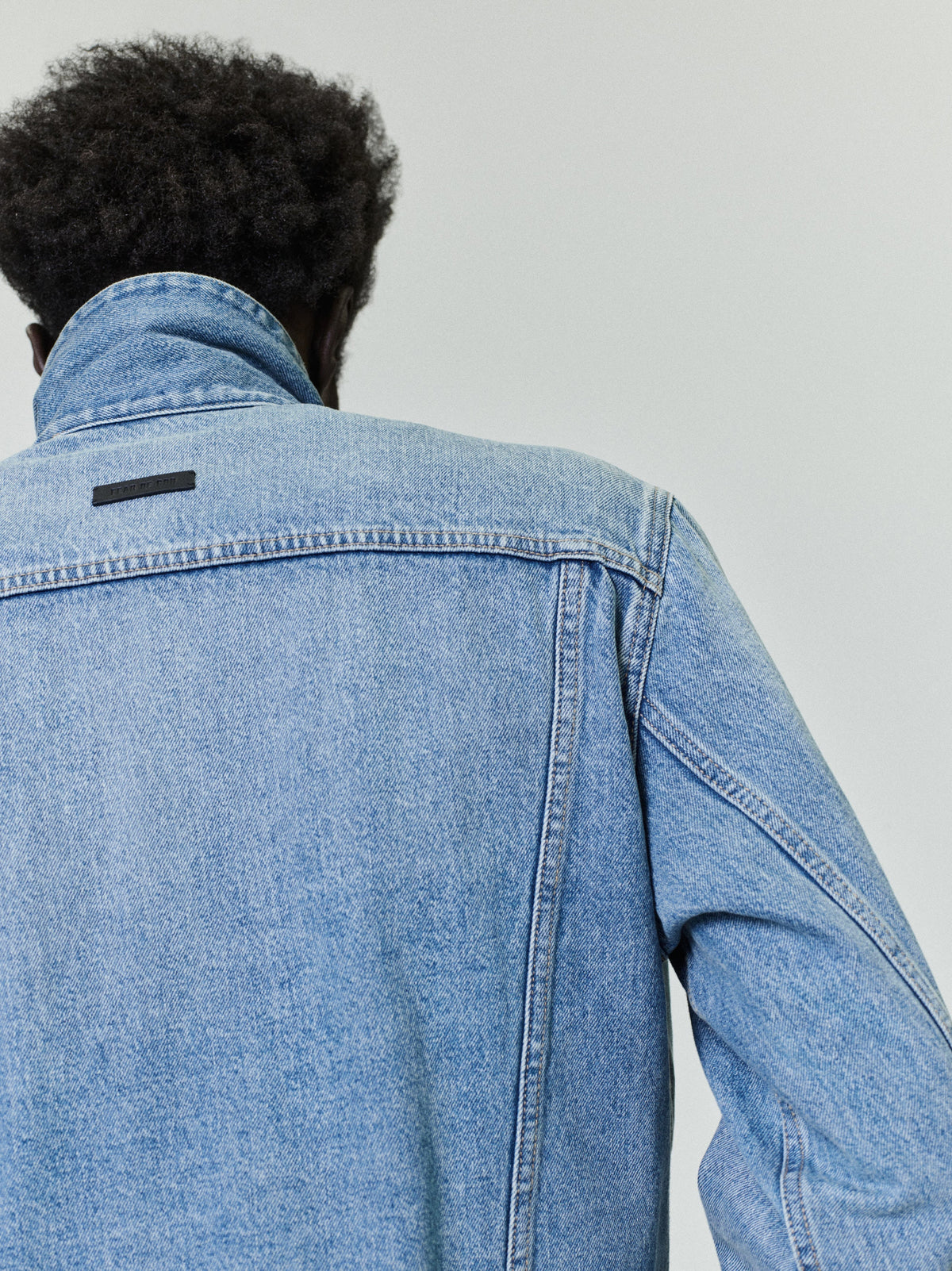 Fear of God Essentials Denim Trucker Jacket Light Indigo BagAg