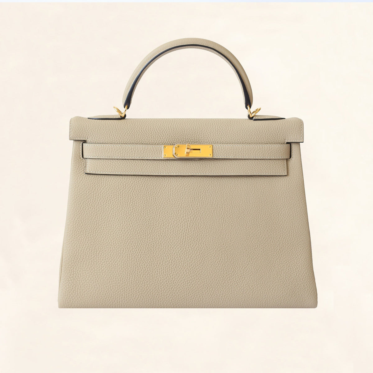 Hermès | Trench Togo Retourne Kelly - Gold Hardware | 32 Crowned Bag