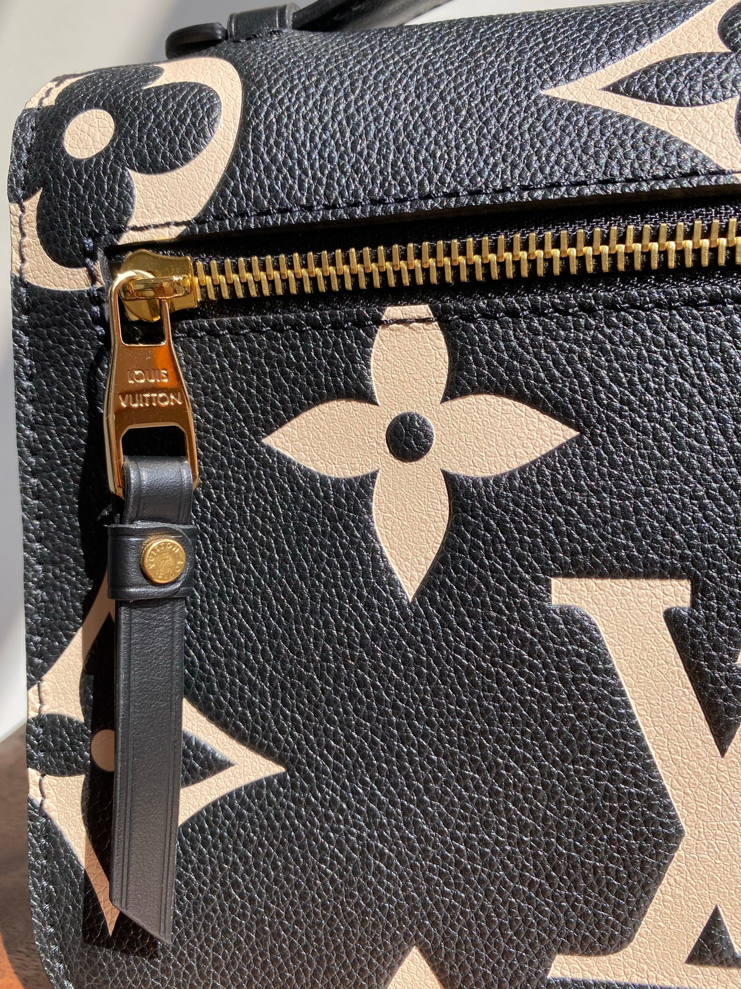 Louis Vuitton LV Crafty Pochette Metis Black Embossed Leather M45385