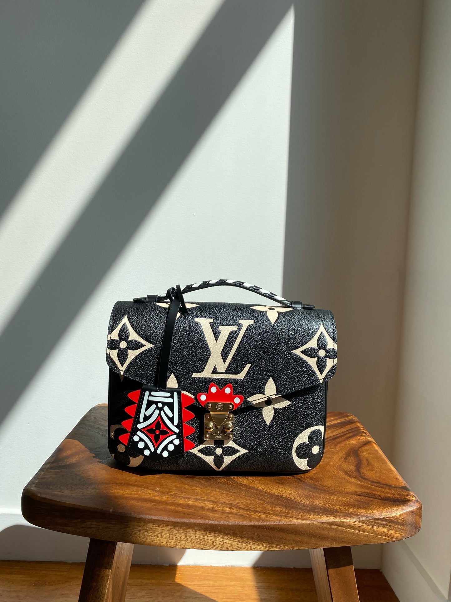 Louis Vuitton LV Crafty Pochette Metis Black Embossed Leather M45385