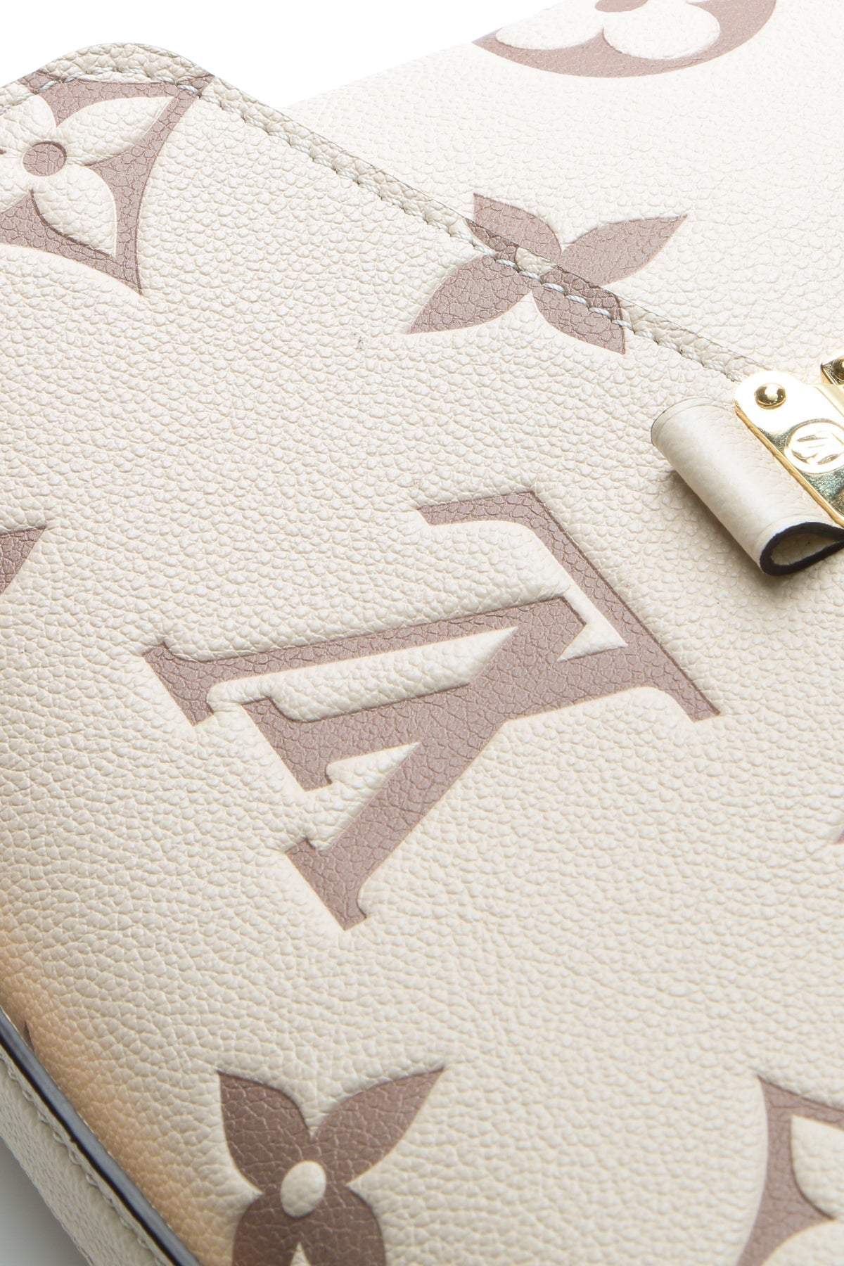 Louis Vuitton Pochette Métis Bicolor Empreinte Cream Dove