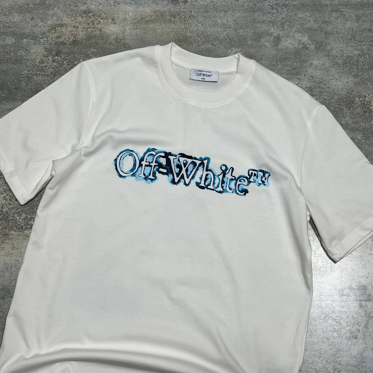 Off-White Cloudy Arrow Skate Logo Men's Women's T-Shirts in 2 Colors Reps Sale UK Best Quality AAA Replica