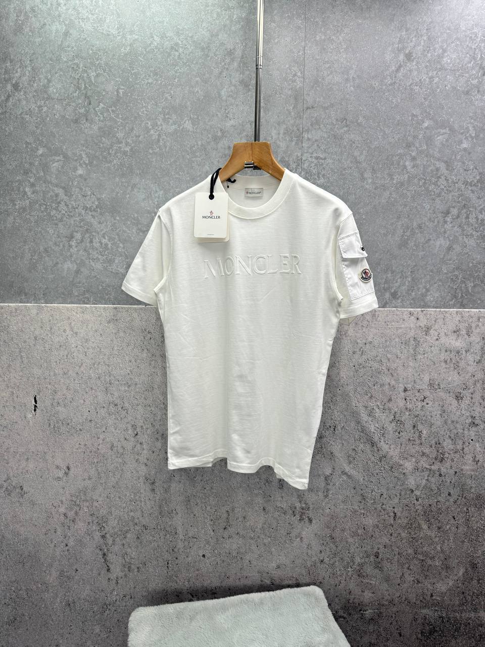 Moncler Embossed Logo Cotton Jersey Sleeve Pocket T-Shirt Men's Women's in 2 Colors Reps UK Best Quality Sale AAA Replica