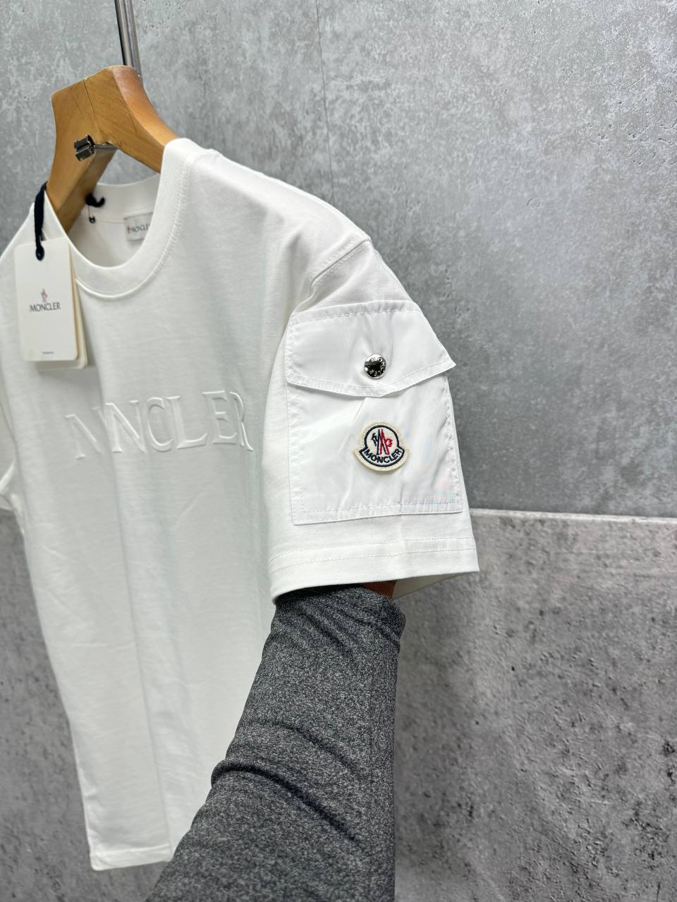 Moncler Embossed Logo Cotton Jersey Sleeve Pocket T-Shirt Men's Women's in 2 Colors Reps UK Best Quality Sale AAA Replica
